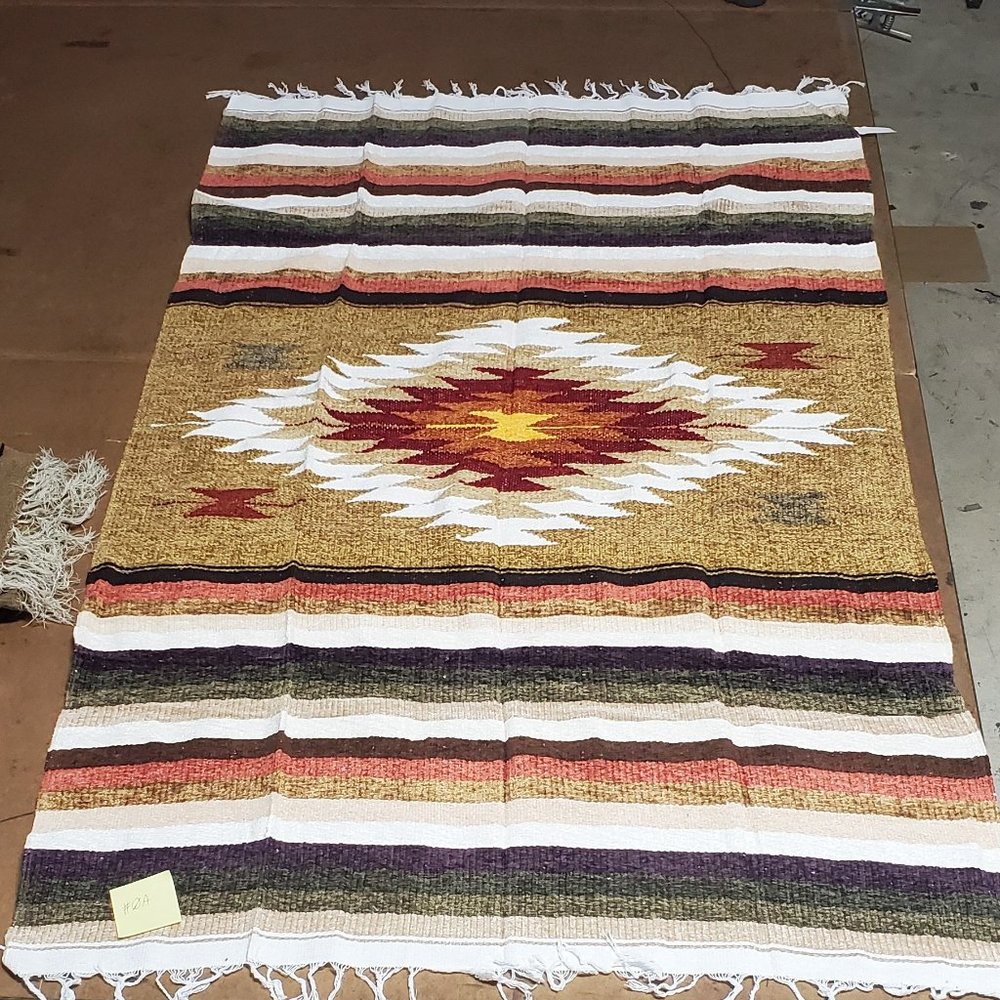 Hand woven chenille blanket with fringes